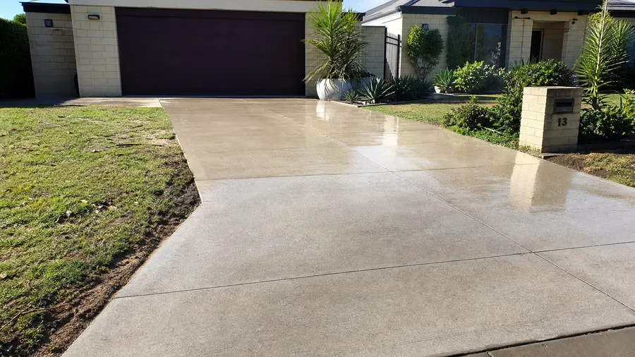 Pristine pressure-washed concrete driveway after cleaning