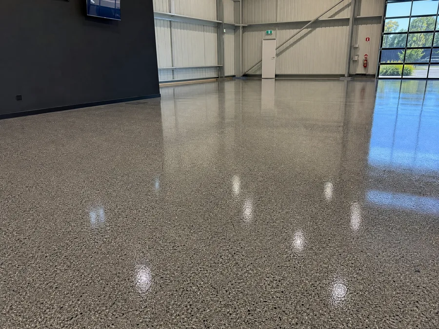 Finished glossy epoxy sealed concrete garage floor
